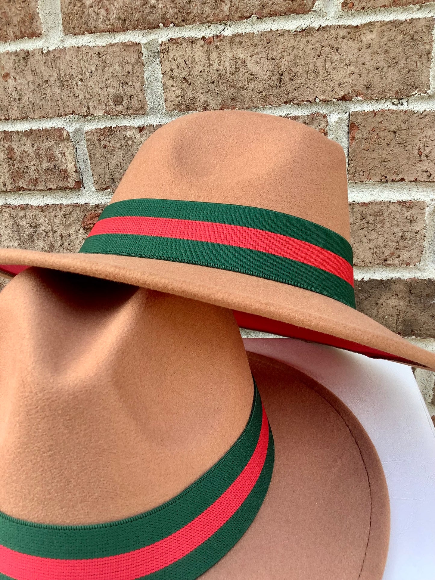 Tan and red classic fedora with band